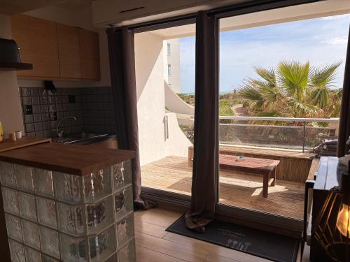 Photo de la galerie de l'établissement Bord de mer, Terrasse et Parking, à Palavas-les-Flots