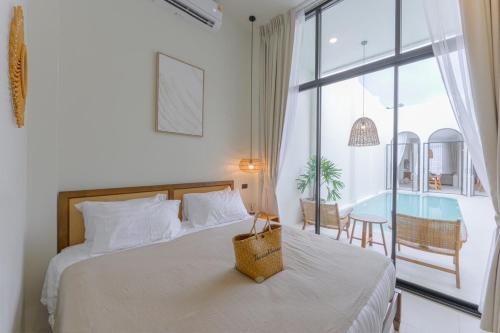 Postel nebo postele na pokoji v ubytování Balina Private Pool Villa