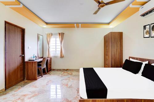 Postel nebo postele na pokoji v ubytování Super Hotel O Sriperambadhur formerly Radha Residency