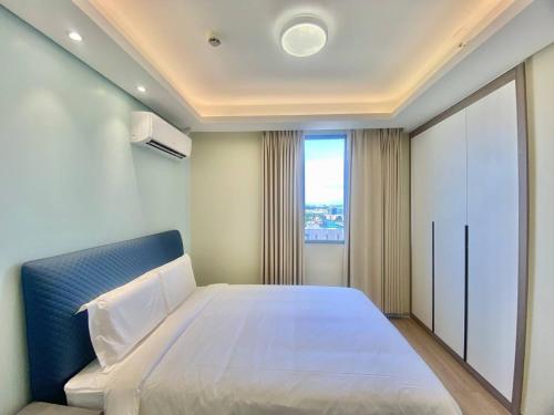 Postel nebo postele na pokoji v ubytování City Center Executive Hotel-Near Manila Airport and PITX