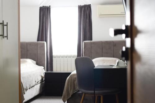 Hotel Tiski Cvetにあるベッド