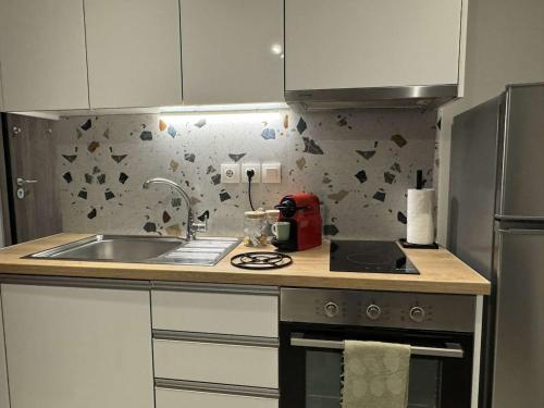 Η κουζίνα ή μικρή κουζίνα στο Kallia apartment