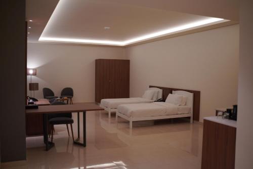 Katil atau katil-katil dalam bilik di Nassim Al Najaf Hotel