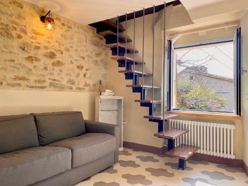 Ein Sitzbereich in der Unterkunft Casa tipica nel borgo - Casa Soemy