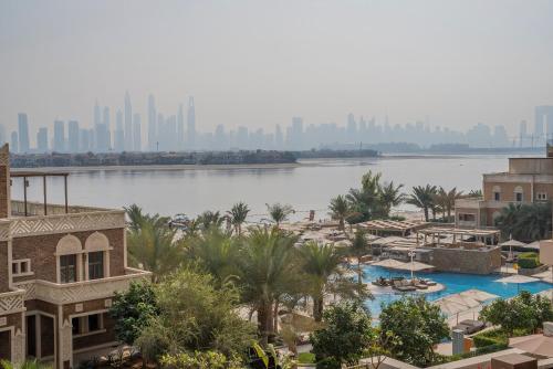 a view of a body of water with a city at Wyndham Residences The Palm in Dubai