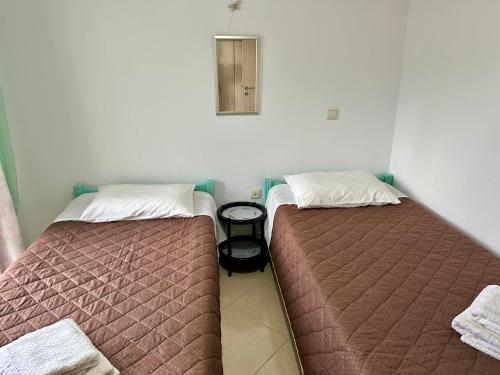 Postel nebo postele na pokoji v ubytování Breeze Holiday Home