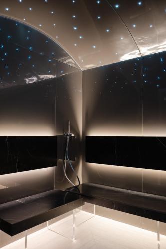 a room with a wall with stars on the ceiling at Emme Palace Hotel & Spa in Orvieto