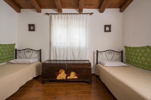 Ένα ή περισσότερα κρεβάτια σε δωμάτιο στο Villa Drakona