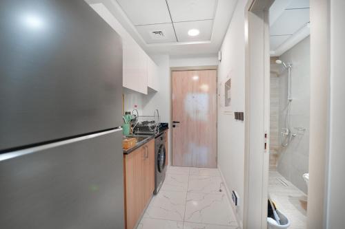 Un baño de EasyGo-Calm STU in Alexia Jebel Ali near Metro