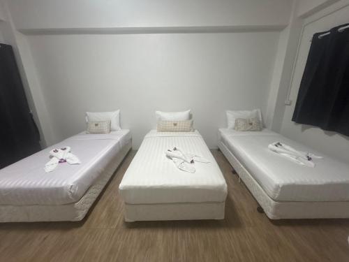 Postel nebo postele na pokoji v ubytování Comfy Hotels Suvarnabhumi Airport