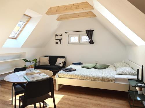 Ένα ή περισσότερα κρεβάτια σε δωμάτιο στο Slovenian House Mira