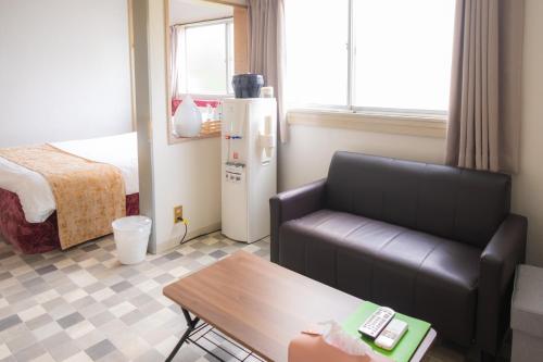 Postel nebo postele na pokoji v ubytování Hotel Lucia at Maebashi Akagi