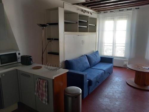 Ruang duduk di Studio de charme à Versailles