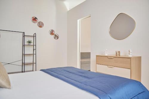 Una cama o camas en una habitación de Milan Retreats Duomo