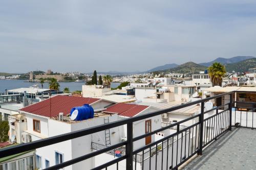 a view of a city from a balcony at Loca Centre Suites in Bodrum City