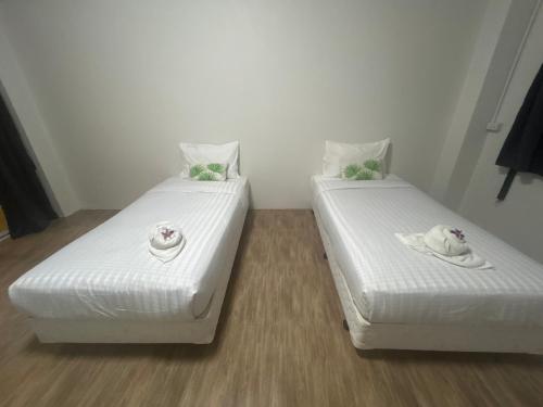 Postel nebo postele na pokoji v ubytování Comfy Hotels Suvarnabhumi Airport