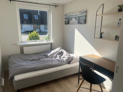 Postel nebo postele na pokoji v ubytování Herning Nord - Tjørring B&B