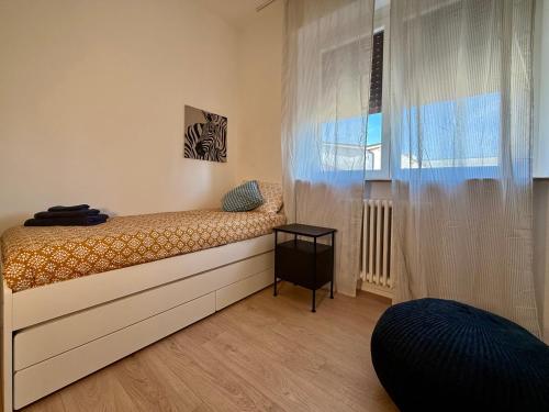 Postel nebo postele na pokoji v ubytování Dependence Manzoni