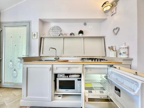 Kuchyň nebo kuchyňský kout v ubytování Residenza della vigna