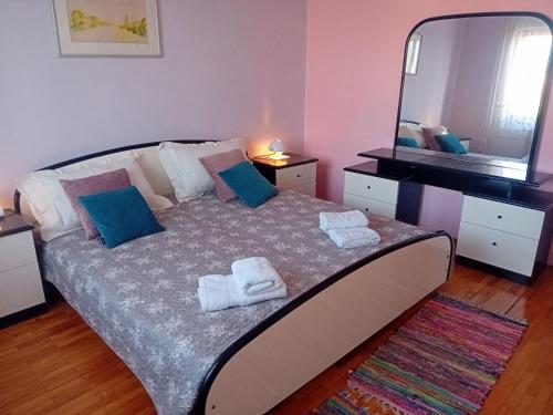 Posteľ alebo postele v izbe v ubytovaní house Divna