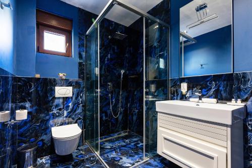 Koupelna v ubytování Maresia Boutique Suites