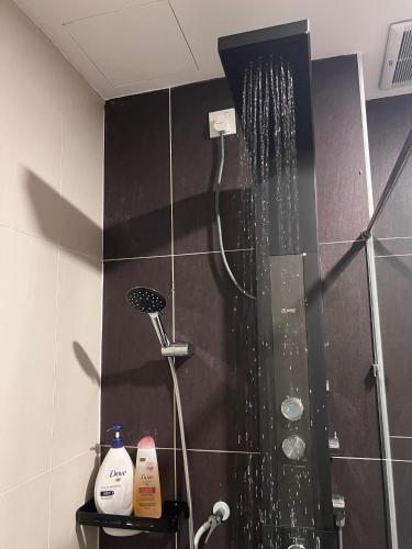 a shower in a bathroom with a shower at Luxury Studio at D Secret Garden - Johor Bahru, UTM, Setia Tropika, Kempas, Paradigm Mall, Mid Valley- 1-3 Pax, Business Trip Welcome in Johor Bahru
