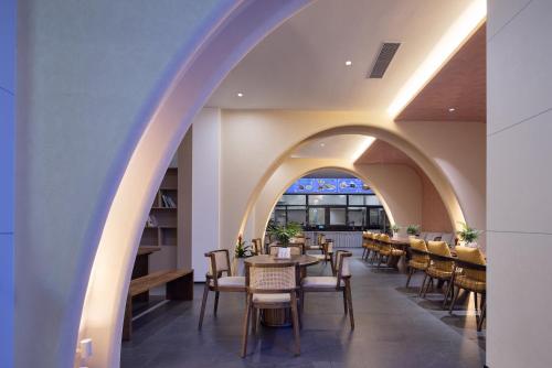 Restaurace v ubytování Lijiang Bamboo Elegance Court Hotel