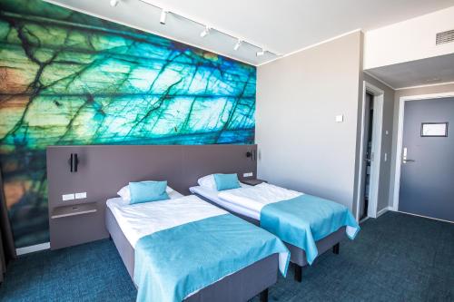 Voodi või voodid majutusasutuse Best Western Plus Hotel Ilulissat toas