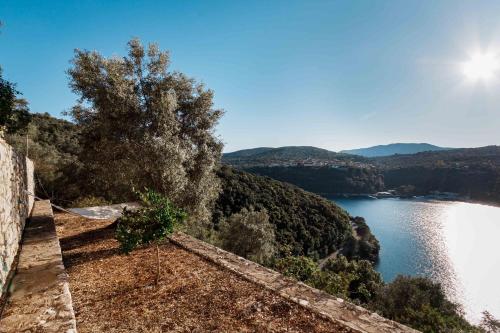 a view of a lake from a house at Panorama Residence in Meganisi