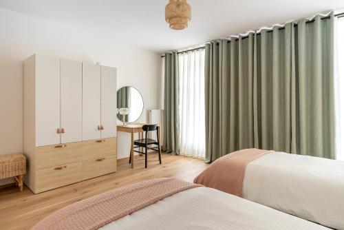 Postel nebo postele na pokoji v ubytování Luxxy Guesthouse
