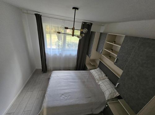 Ένα ή περισσότερα κρεβάτια σε δωμάτιο στο Apartament M&B