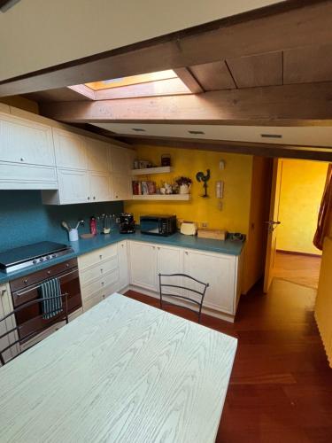 Kuchyň nebo kuchyňský kout v ubytování Casa vacanze Colleoni