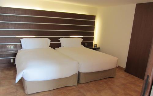 Katil atau katil-katil dalam bilik di Auberge de Oishi