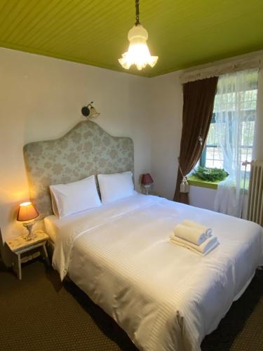 Postel nebo postele na pokoji v ubytování Shamrock Elati Retreats