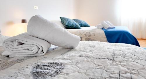 Postel nebo postele na pokoji v ubytování Albergo Dalla Mena