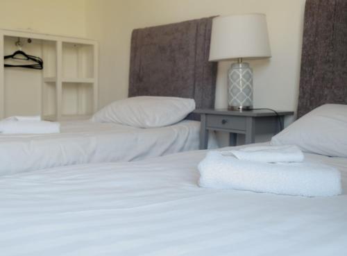 Cama o camas de una habitación en Mocha Beans Westport