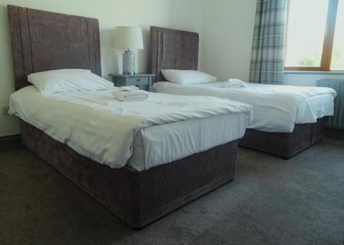 Cama o camas de una habitación en Mocha Beans Westport