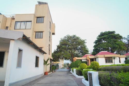 a street in front of a building at Hotel Yashoda in Pune