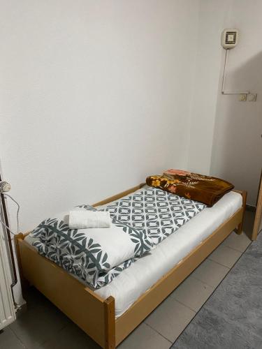 Postel nebo postele na pokoji v ubytování Apartmani Alejna
