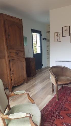 Ruang duduk di Nouveau gîte Beaulieu à Combree