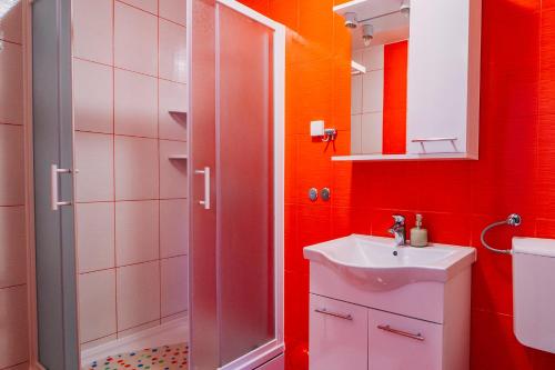 a bathroom with a shower and a sink at Luxur house with seaview teracce in Baška Voda