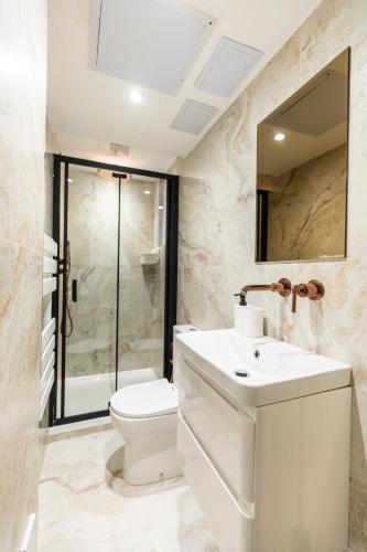 Koupelna v ubytování Mayfair Residences