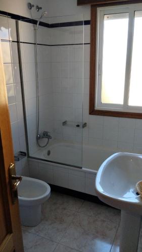 Ένα μπάνιο στο Apartamentos Dunamar