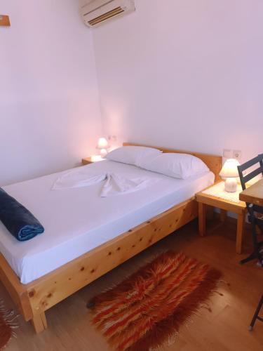 Una cama o camas en una habitación de TeArra GuestHouse