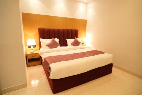 Postel nebo postele na pokoji v ubytování Hotel Journee