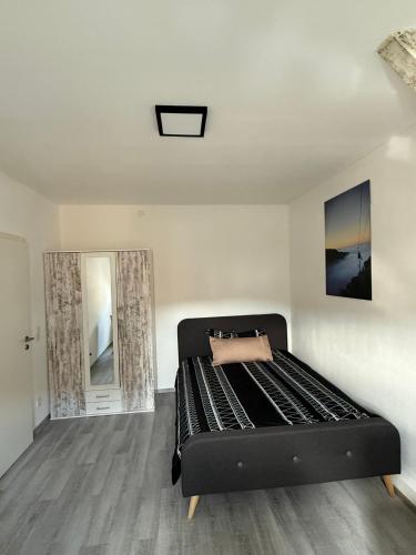 Una cama o camas en una habitación de Guestroom K17