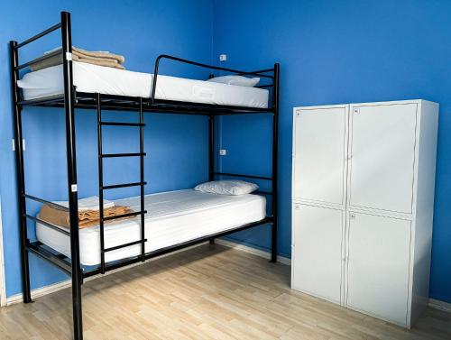 Letto o letti in una camera di Urban Garden Hostel