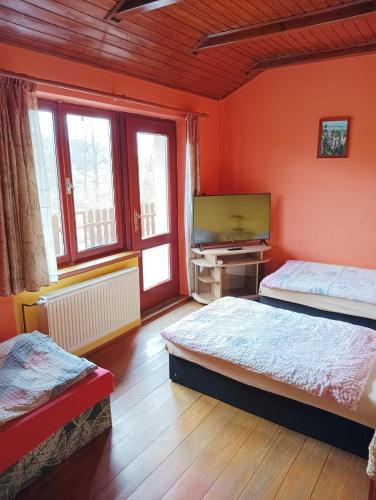 Postel nebo postele na pokoji v ubytování Penzion Burda