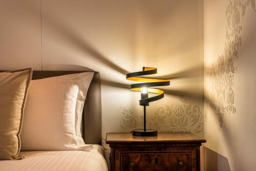 Letto o letti in una camera di PALAZZO RISTORI