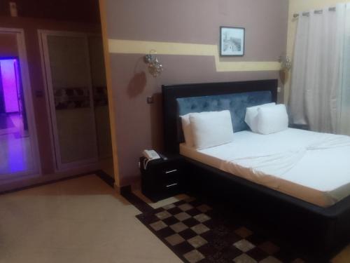 Postel nebo postele na pokoji v ubytování hotel Daniel's 1er